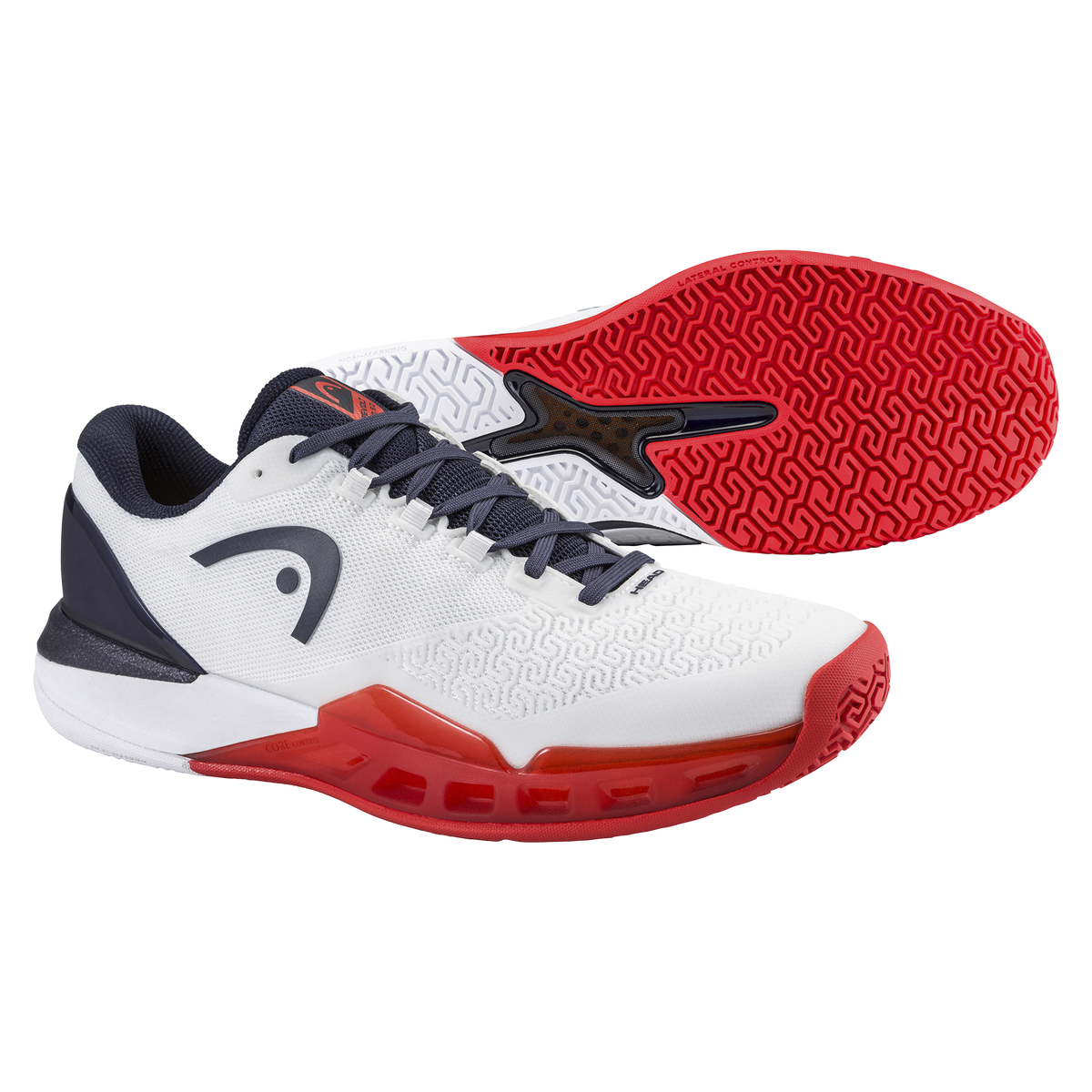 Product image of a white and navy HEAD Revolt Pro men’s tennis shoe on a black background, featuring one shoe in side profile with a breathable mesh upper, dark laces, HEAD logo, and red-accented cushioned midsole, alongside a second shoe flipped to show the red non-marking outsole with geometric traction pattern and lateral stability support.