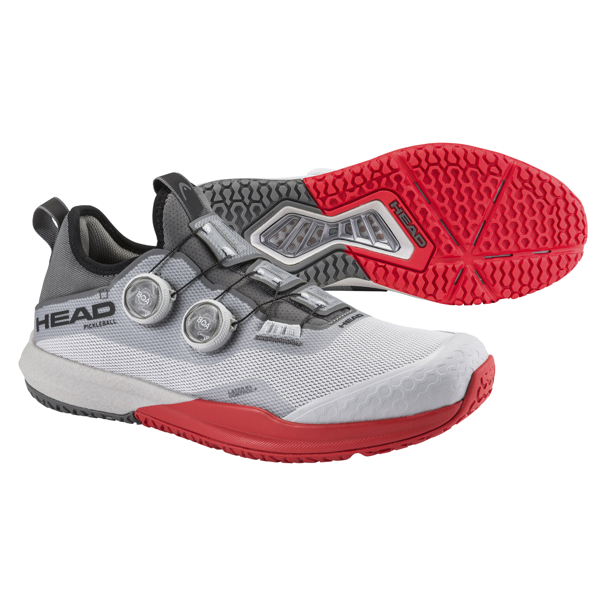 Product image of the HEAD Motion Pro BOA Pickleball shoe in light gray with red outsole, featuring a BOA dial closure system, breathable mesh upper, reinforced toe, and a high-traction rubber sole shown from side and bottom views.