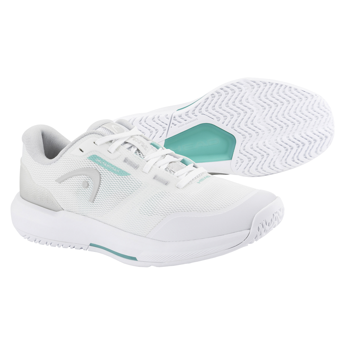 White HEAD Revolt Evo 5.0 women’s tennis shoes shown on a black background, featuring a breathable mesh upper with subtle mint accents, cushioned midsole, reinforced toe cap, and a non-marking herringbone outsole displayed to highlight traction and durability.