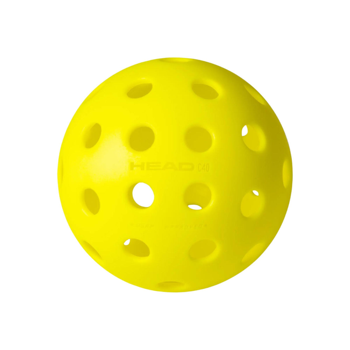 Close-up of a HEAD Championship 40 outdoor pickleball with evenly spaced holes on the surface.