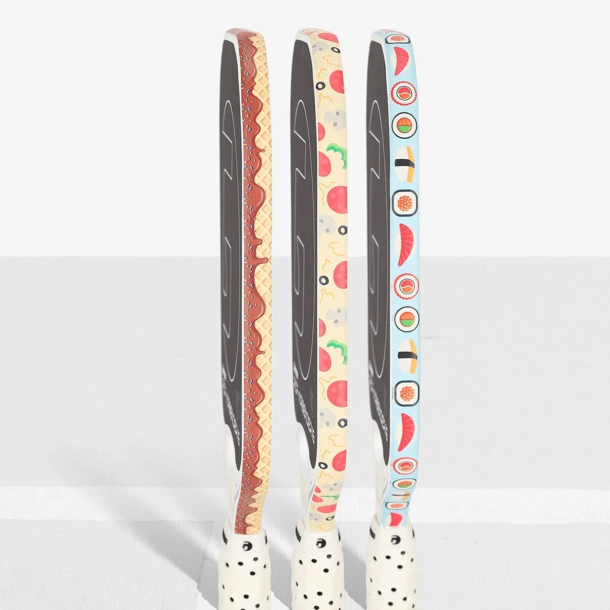 Pickleball paddle edge guard tape with food-themed patterns designed to protect paddle edges from wear and damage.