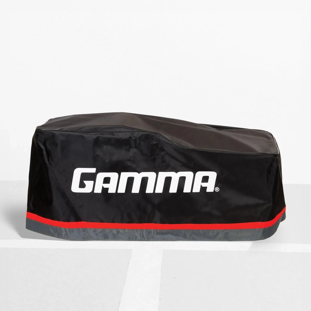 Protective cover designed for compact equipment, featuring a fitted shape to shield against dust and debris.