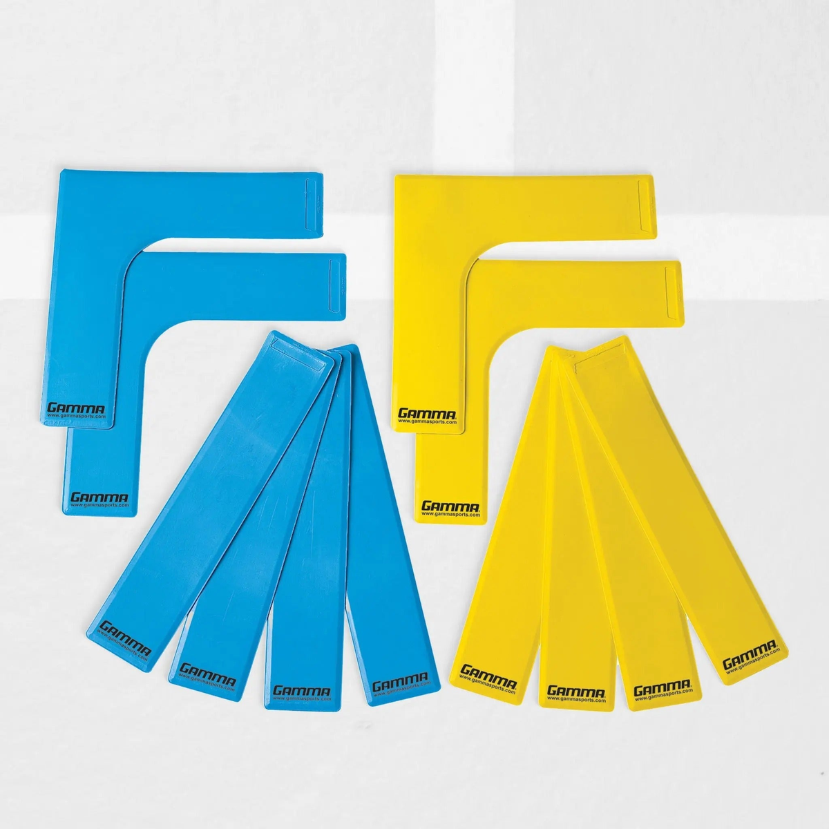 Set of flat court marker lines including L-shaped corners and straight strips used to create temporary boundaries for training or mini court setups.