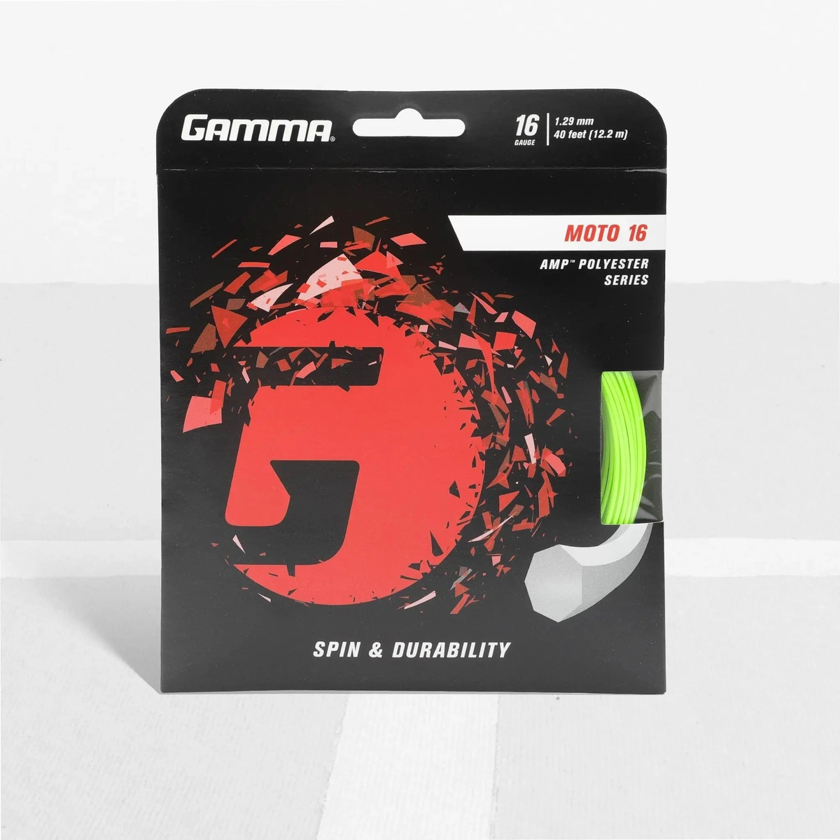 Packaged polyester tennis string set with branded card backing and visible coiled string segment, designed for spin and durability performance.