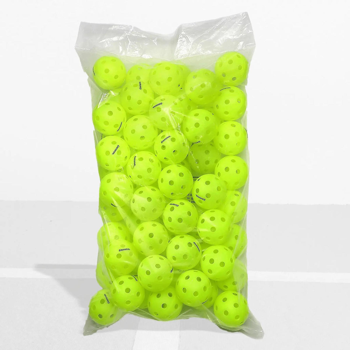Indoor pickleball with precision-drilled holes, designed for consistent bounce and controlled play on indoor courts.