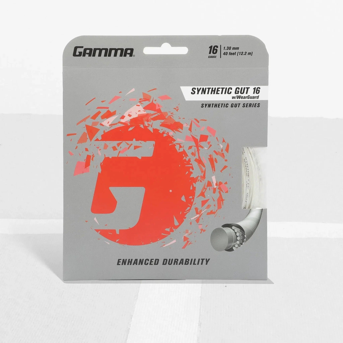 Tennis racket synthetic gut string set with wear-resistant construction in retail packaging, designed for enhanced durability and performance.