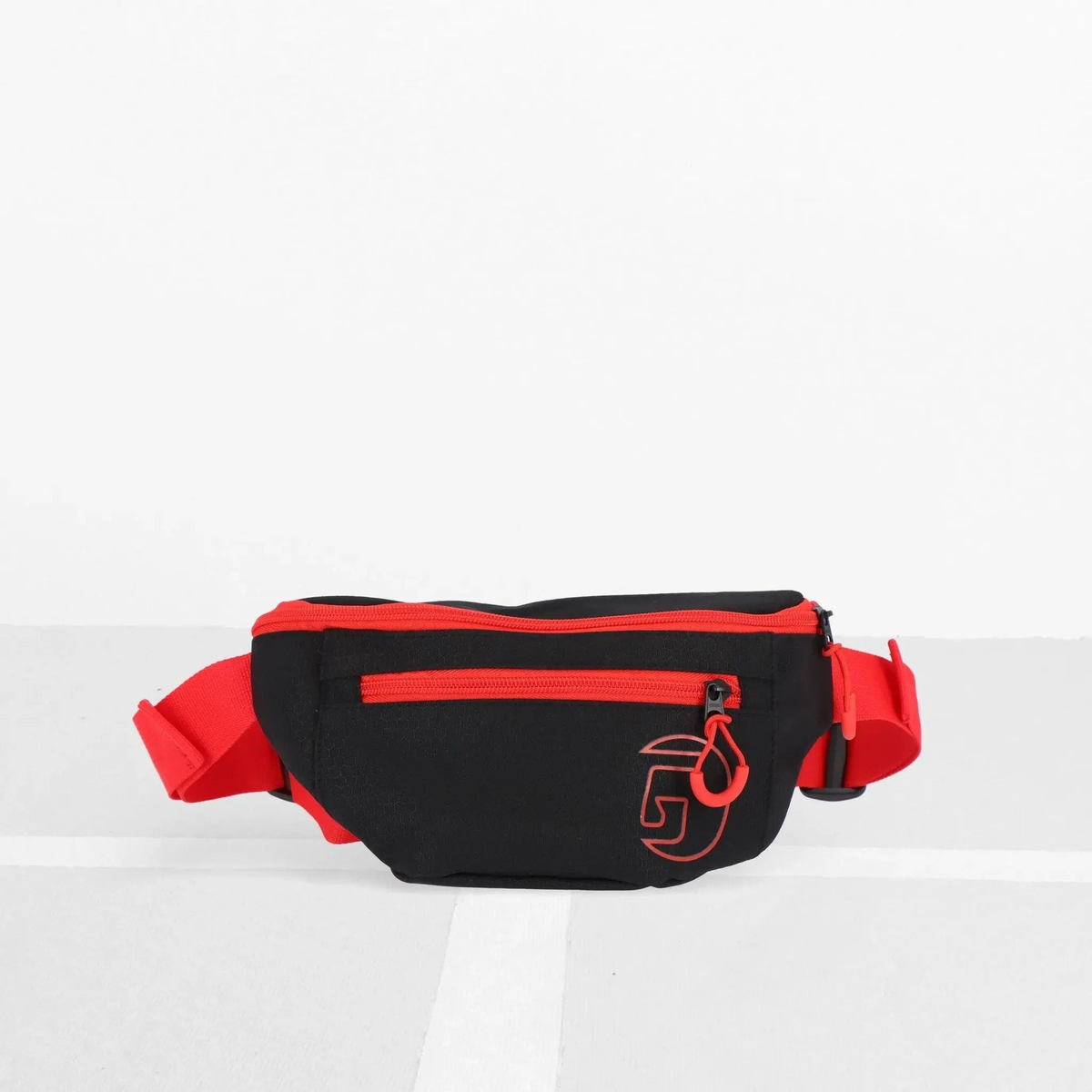 Sport fanny pack with adjustable strap and zippered compartments, designed for convenient storage of personal items during activities.