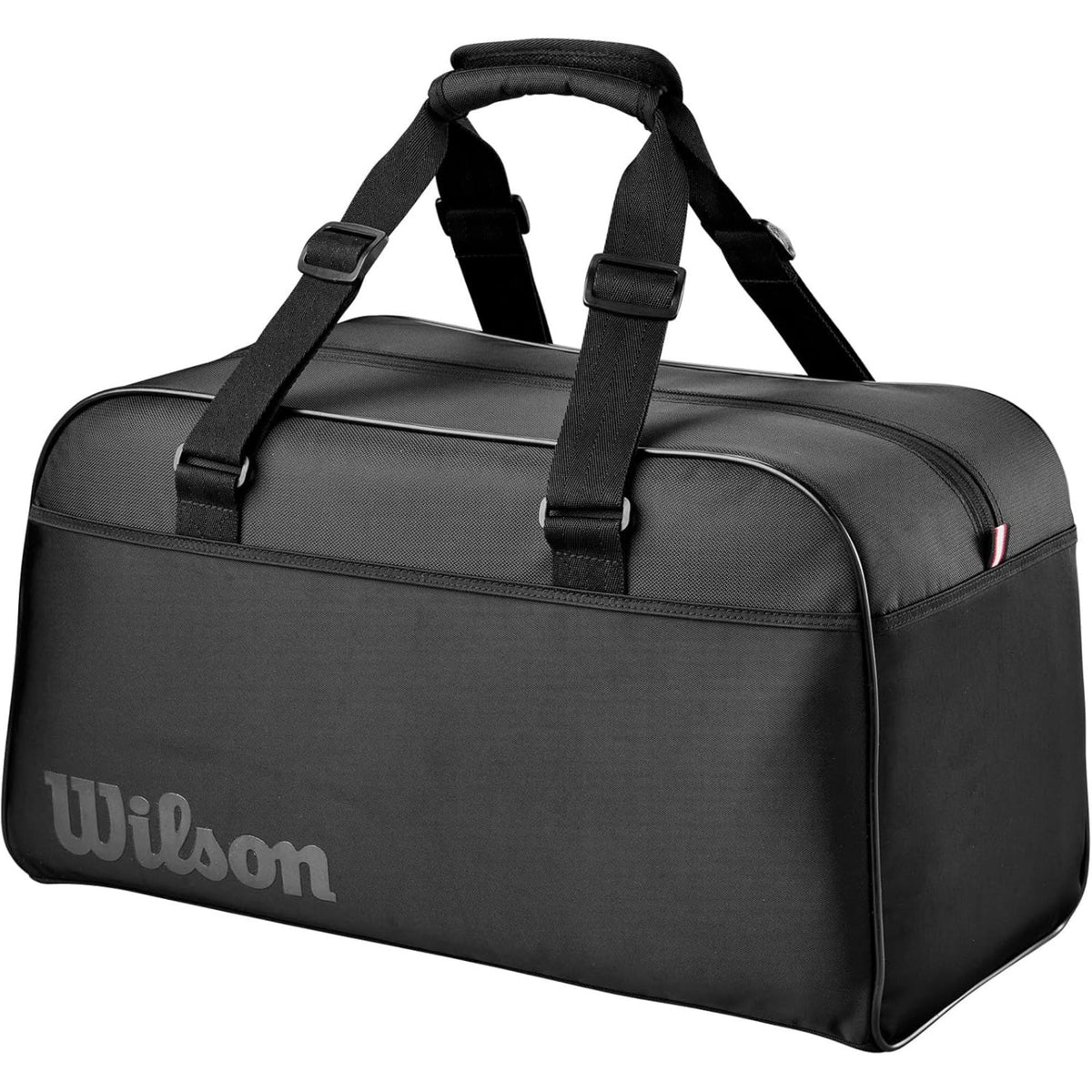 Wilson Golf Tour duffle bag in black with large Wilson logo, dual carry handles, and spacious zippered main compartment, shown on a white background.