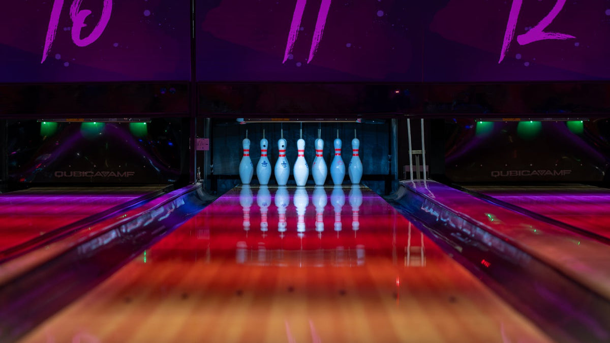 Urethane bowling balls for controlled lane motion