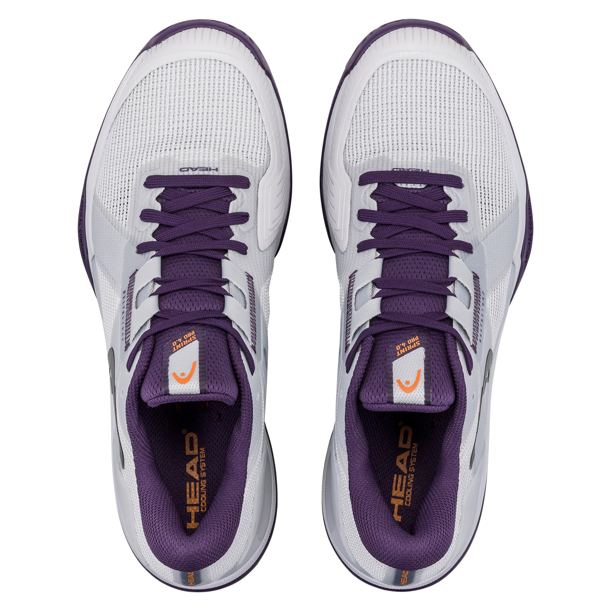 A studio product image of the HEAD Sprint Pro 4.0 men’s tennis shoe in a white and purple colorway on a black background. One shoe is shown in side profile highlighting the breathable mesh upper, DeltaStrap support system, and HEAD logo, while the second shoe is positioned behind it to display the purple non-marking outsole with a textured herringbone-style tread and an orange midfoot support element.