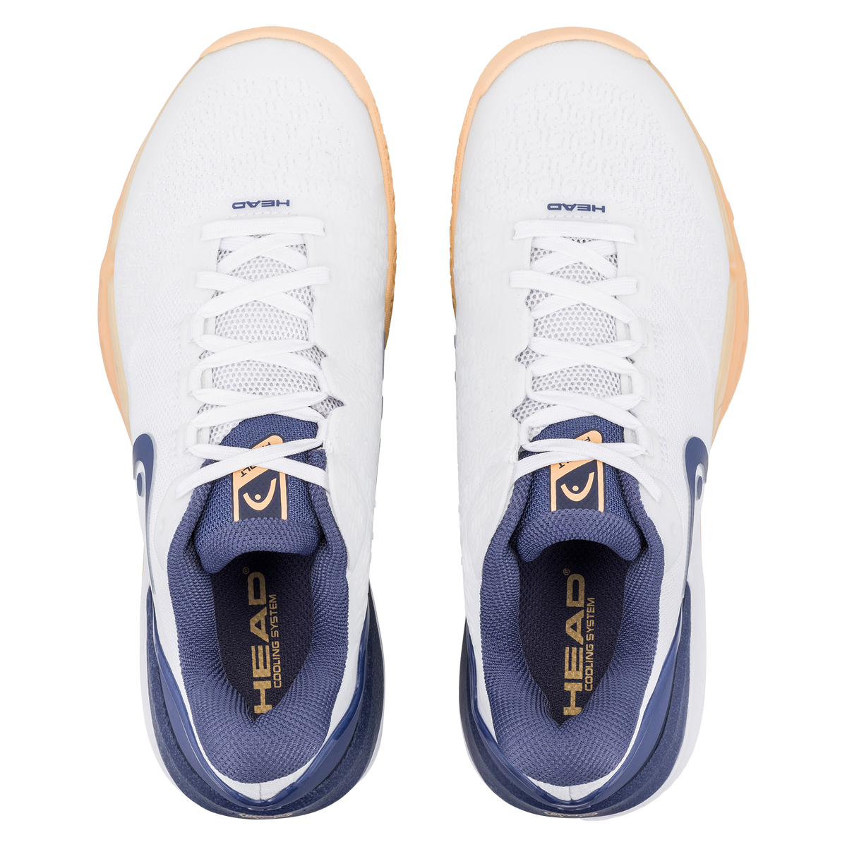 Studio product image of a HEAD Revolt Pro 5.0 women’s tennis shoe in white and navy with a gum outsole, shown with a second shoe displaying the patterned sole for traction and lateral support.