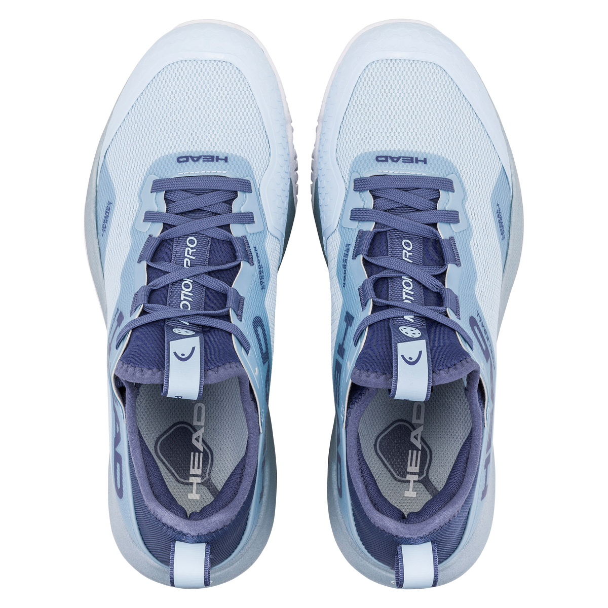 HEAD Motion Pro women’s pickleball shoe in light blue and navy, shown in a studio product view with one shoe angled forward and the other displaying the outsole, highlighting breathable mesh upper, lateral support structure, cushioned midsole, and non-marking pickleball-specific tread.