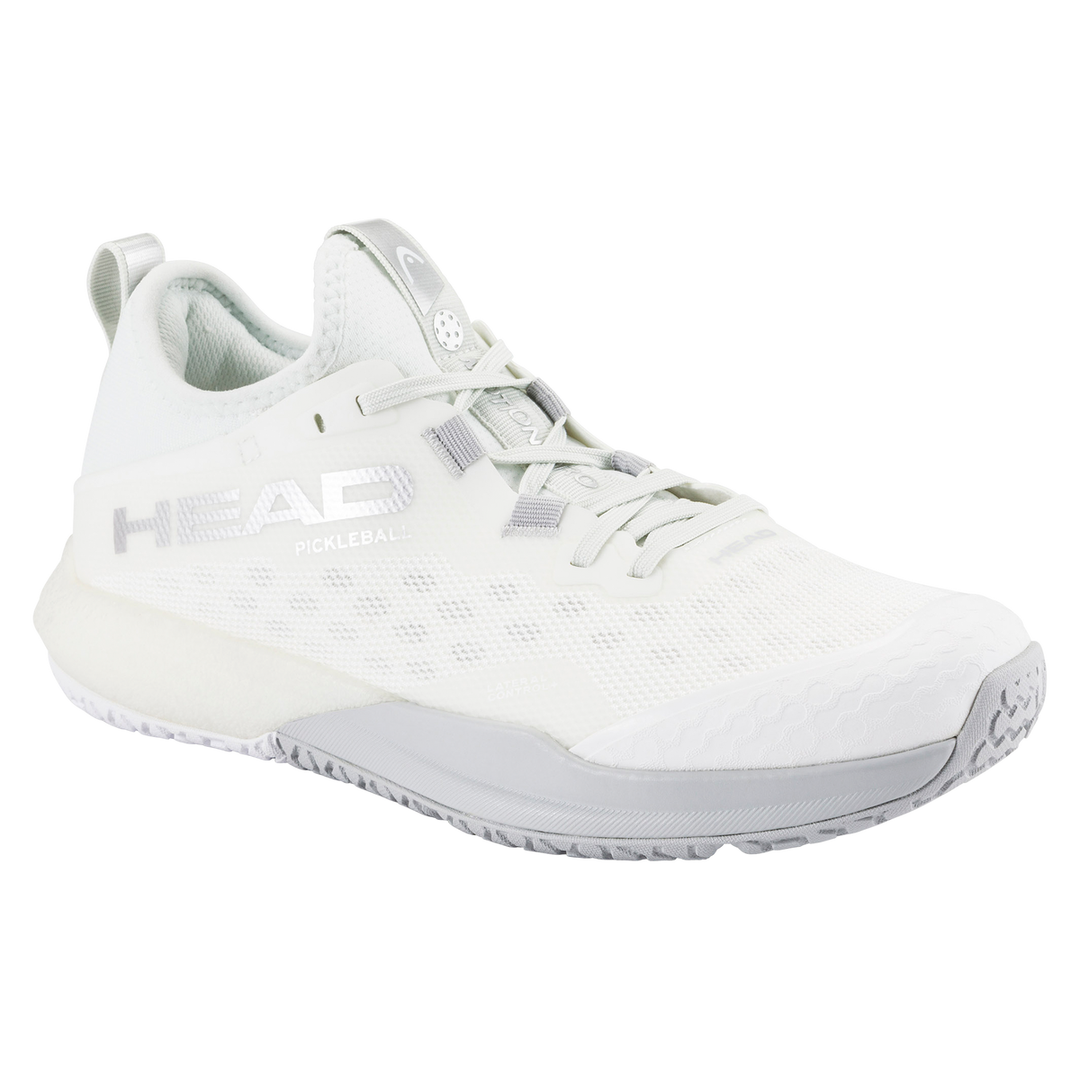 HEAD Motion Pro women’s pickleball shoe in white, shown in a studio product view with one shoe angled forward and the other displaying the outsole, highlighting the breathable mesh upper, reinforced lateral support, cushioned midsole, and non-marking pickleball-specific tread.