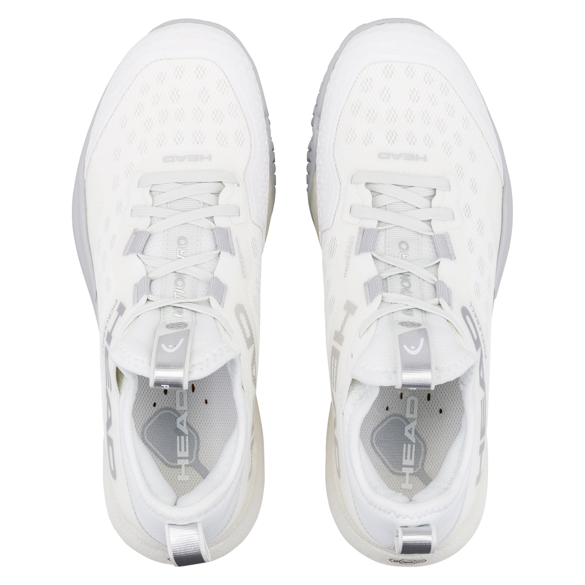 HEAD Motion Pro women’s pickleball shoe in white, shown in a studio product view with one shoe angled forward and the other displaying the outsole, highlighting the breathable mesh upper, reinforced lateral support, cushioned midsole, and non-marking pickleball-specific tread.
