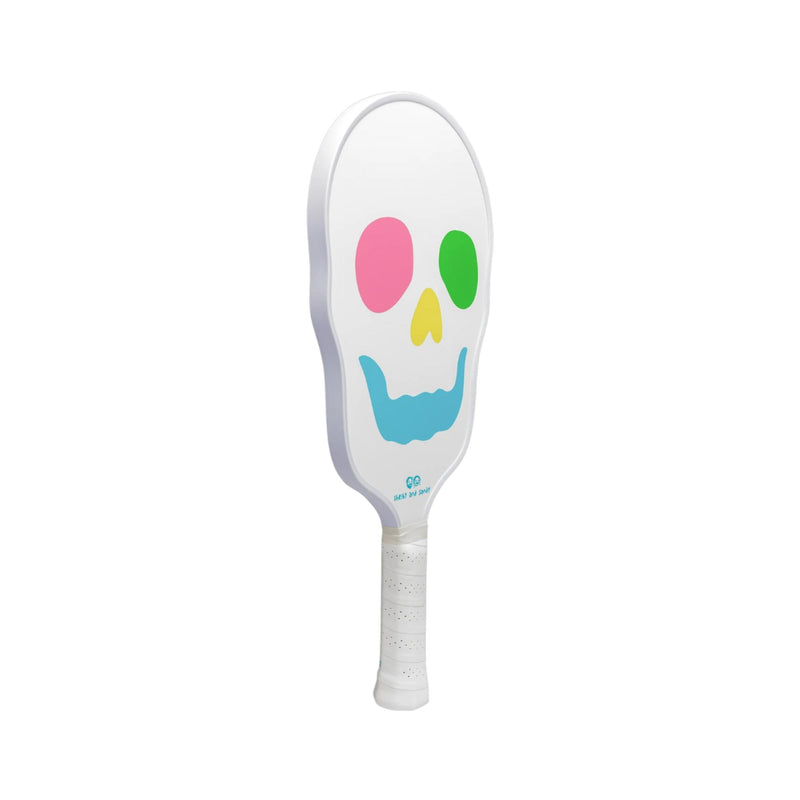 Pickleball paddle featuring a skull graphic design with colorful facial details and a cushioned grip handle.