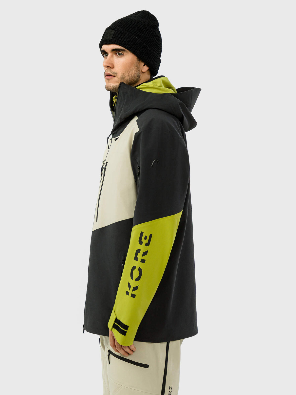 HEAD KORE Freeride Ski Jacket Mens in Black/Marsh Green - side view on model
