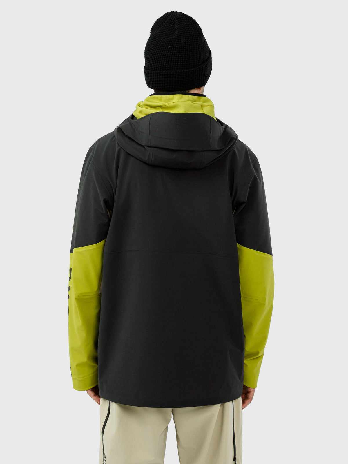 HEAD KORE Freeride Ski Jacket Mens in Black/Marsh Green - back view on model