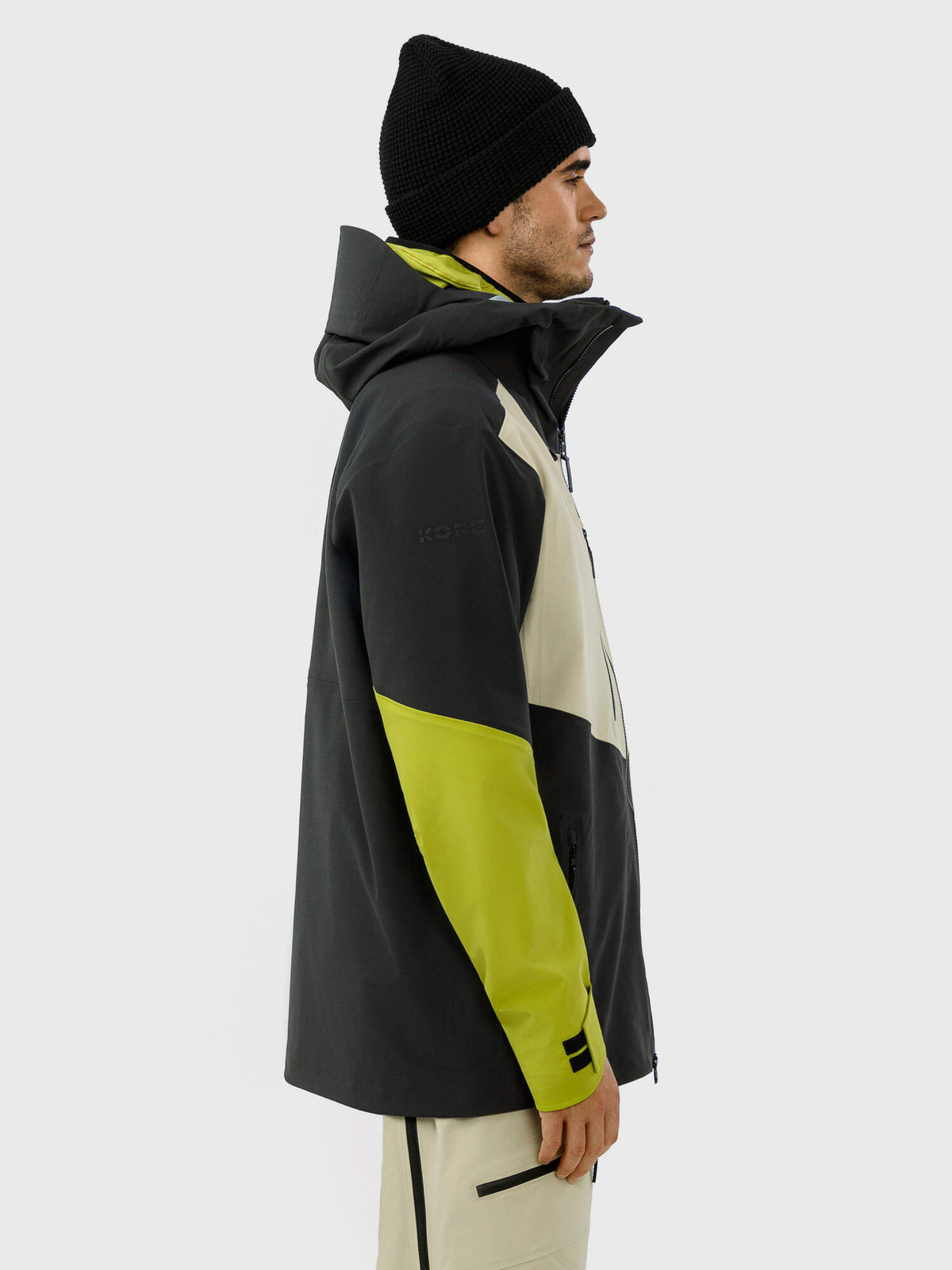 HEAD KORE Freeride Ski Jacket Mens in Black/Marsh Green - side view on model