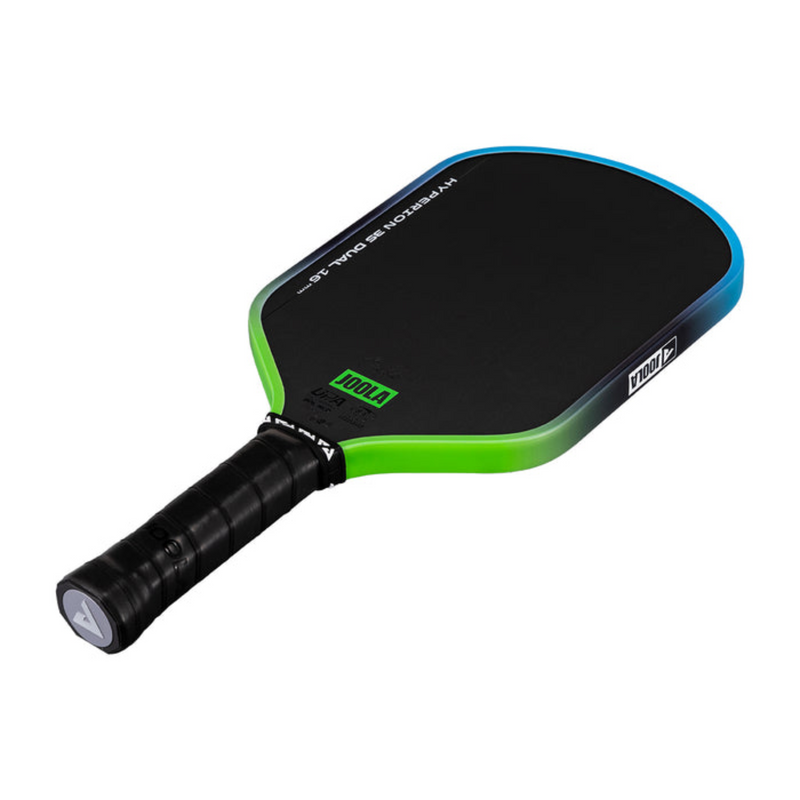 Pickleball paddle with black and green design on a white background