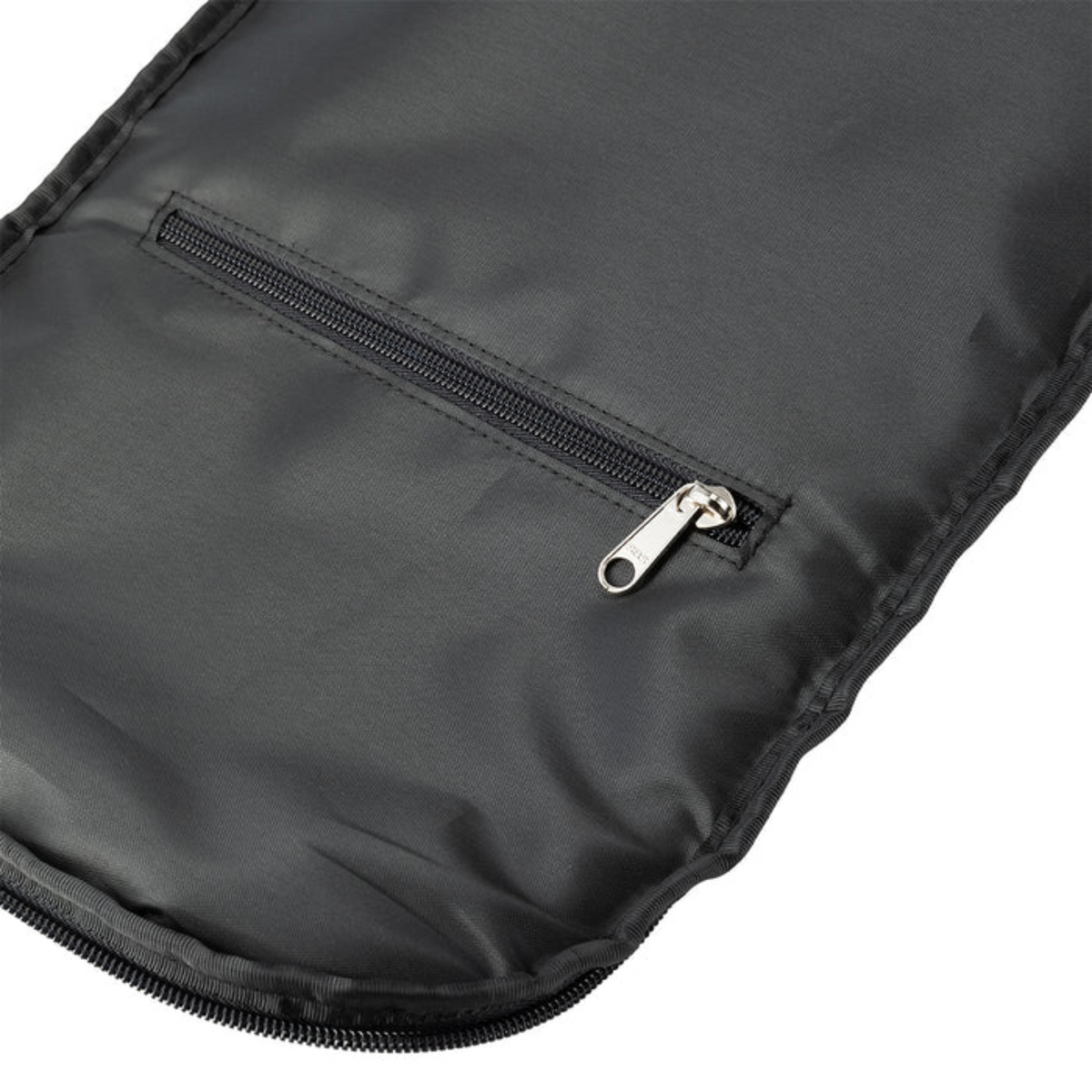 Close-up of a black zippered bag corner on a white background