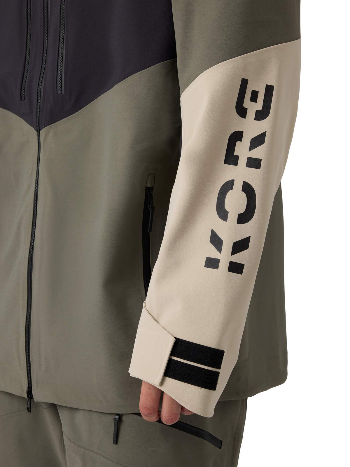 HEAD KORE Freeride Ski Jacket Mens in Green Sand/Black - sleeve detail