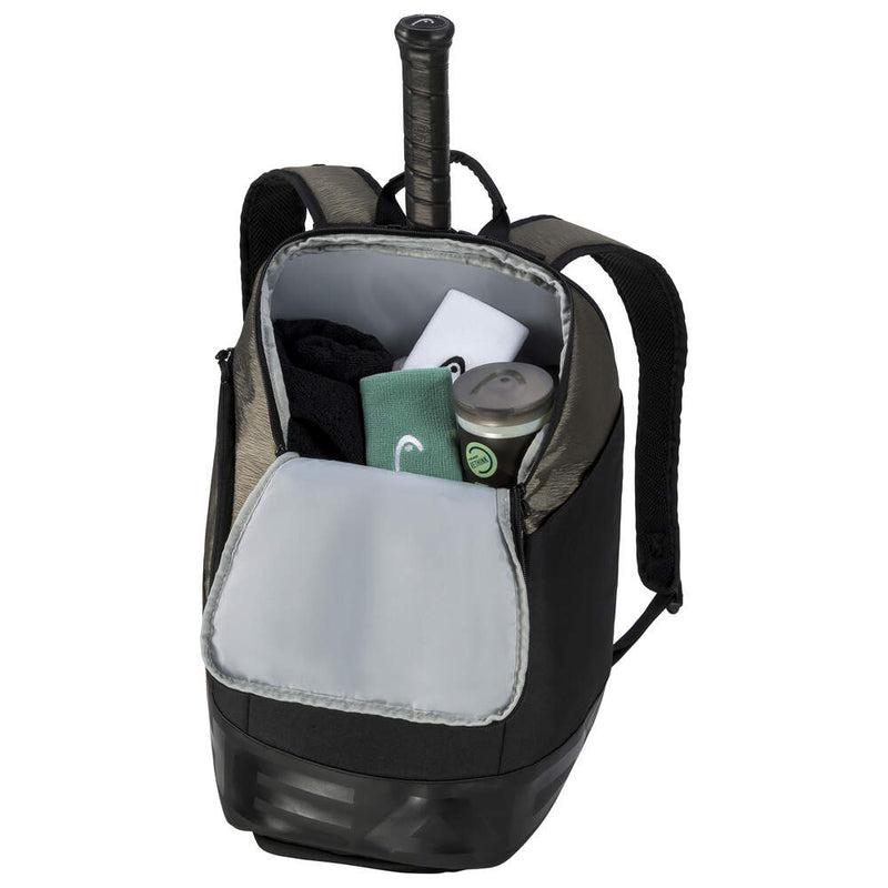 Head backpack that shows paddle and accessories and ball inside.