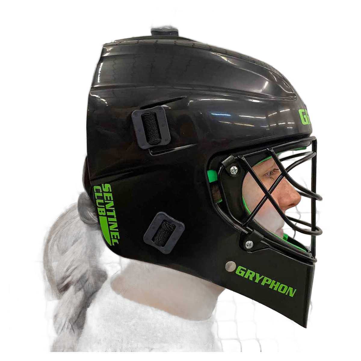 GRYPHON Sentinel field hockey goalkeeper helmet featuring a protective outer shell, full face cage, and padded interior for impact protection and comfort.