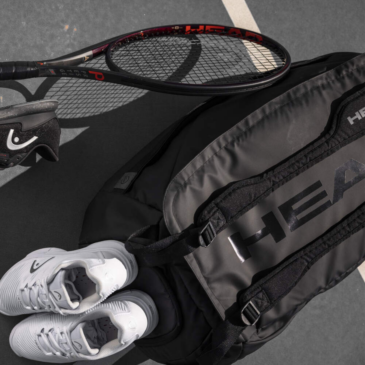 Head Tennis Lifestyle Photo showing bag, racquet, and shoes