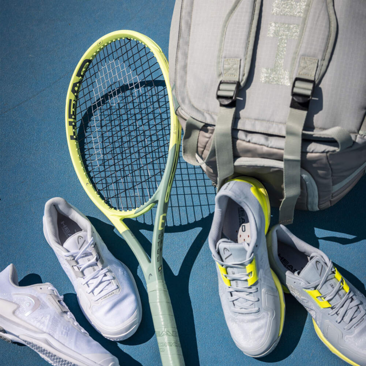 Head lifestyle photo showing shoes bag racquet