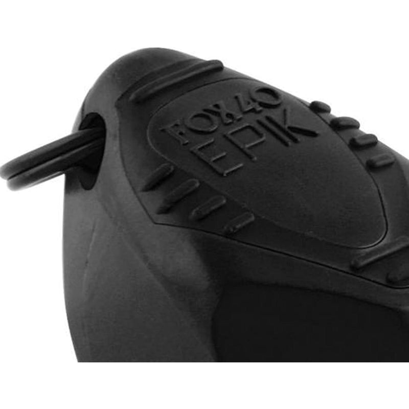 Ergonomic safety whistle with cushioned mouth grip and compact design, suitable for sports officiating or emergency signaling.