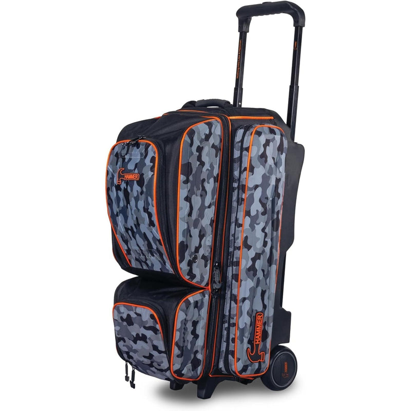 Triple roller bowling bag with telescoping handle, wheels, hard shell panels, and multiple zippered compartments for organized storage and transport of bowling balls and accessories.
