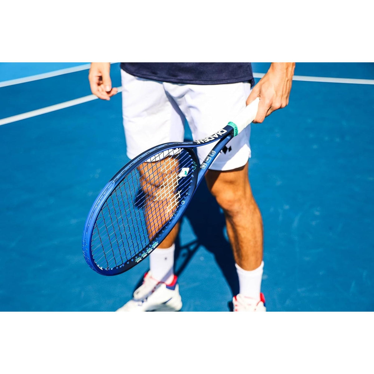 Diadem Elevate ELT tennis racket shown from front and side views, featuring an open string bed and standard grip handle.