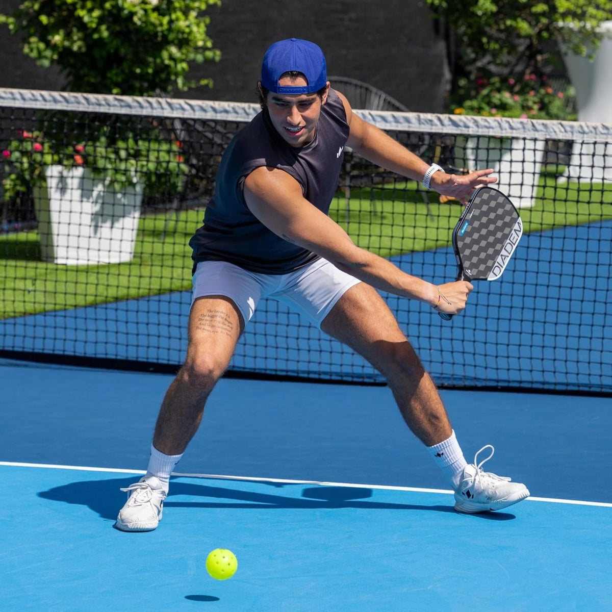 Diadem Edge BluCore Hybrid pickleball paddles featuring a carbon fiber face with geometric pattern, shown stacked with handles visible and product detail graphic.