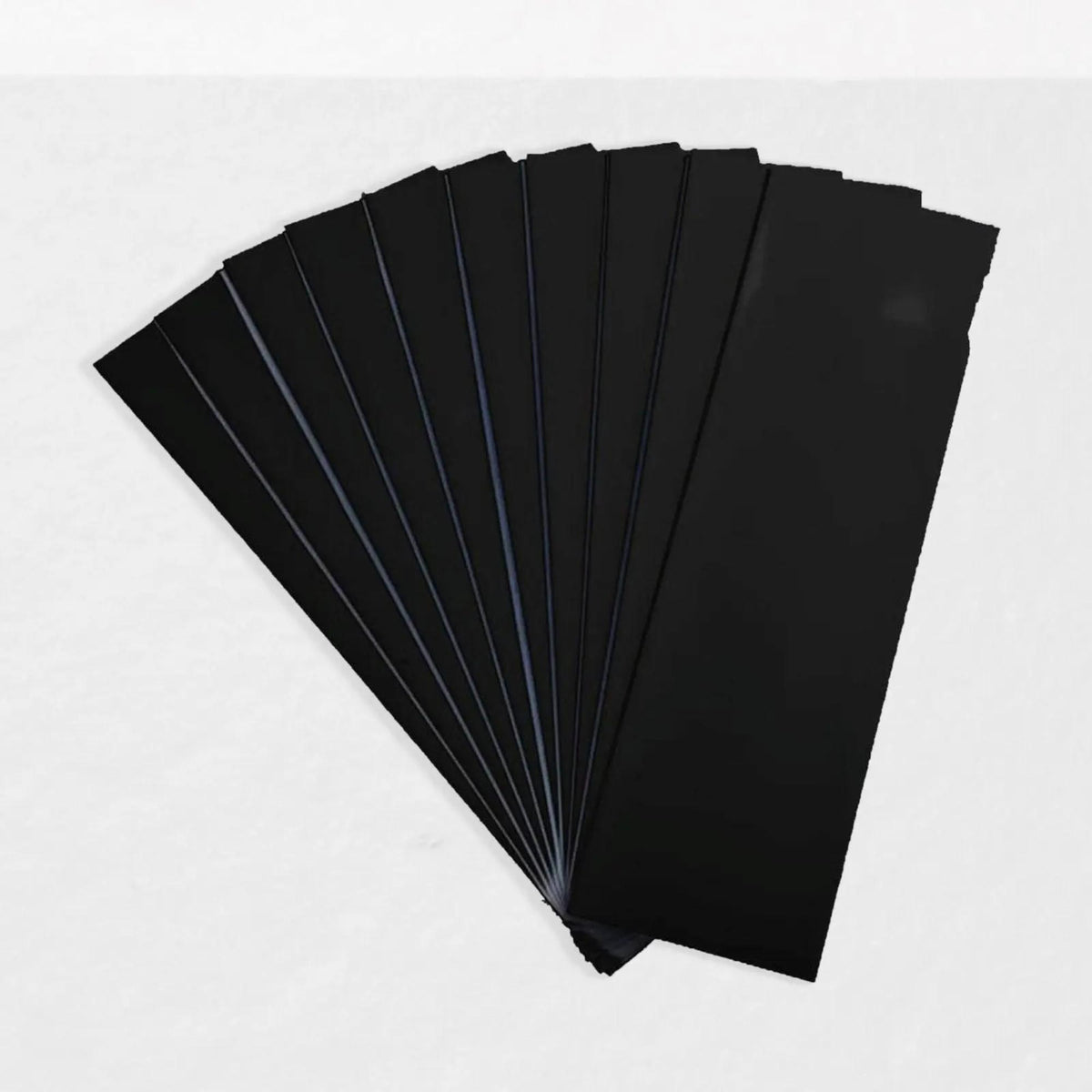 Pack of grip build-up sleeves designed to increase handle size and improve comfort and control on racquet handles.