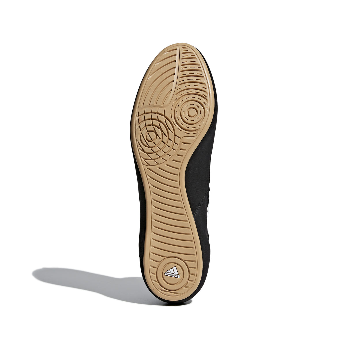 Black high-top wrestling shoe with a breathable mesh upper, black laces, padded ankle strap, and three white diagonal stripes on the side; shown from side and sole views, featuring a tan gum rubber outsole with circular traction patterns and Adidas logo for grip, stability, and mat control.