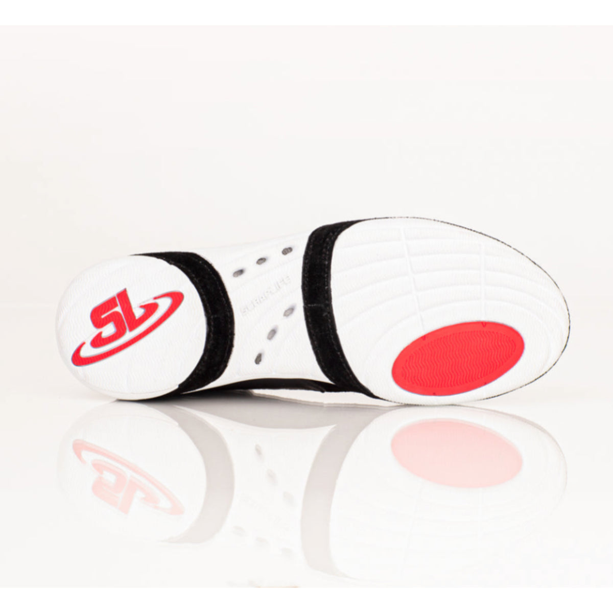 White sneaker with red and black accents on a white background