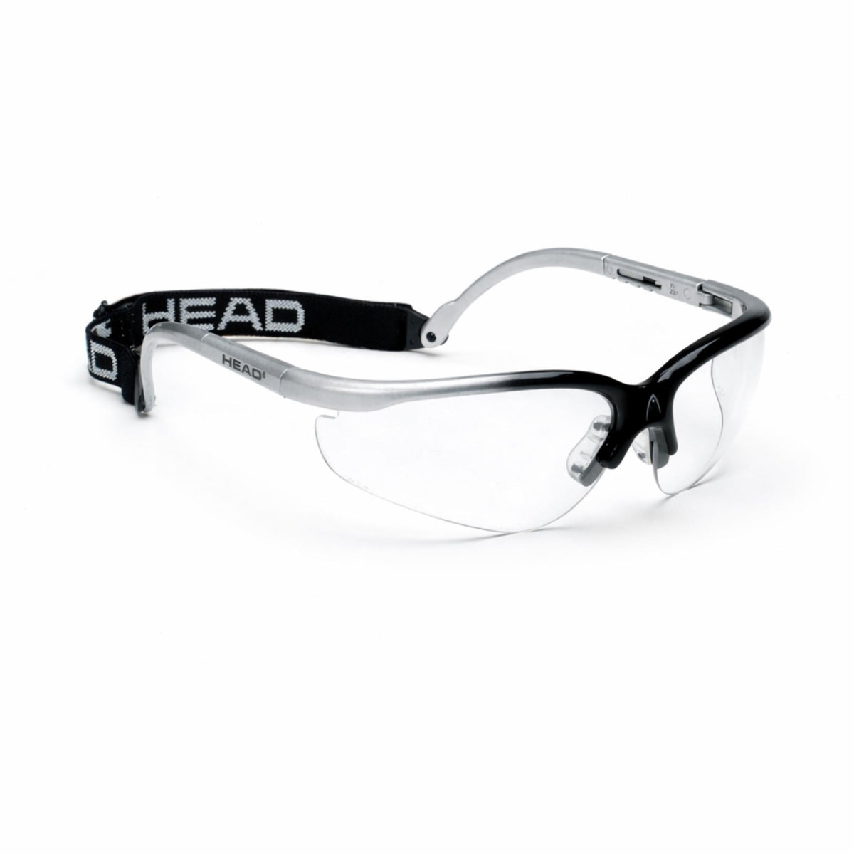 Black and silver HEAD sports protective eyewear with clear wraparound lenses and adjustable elastic strap, shown on a white background.