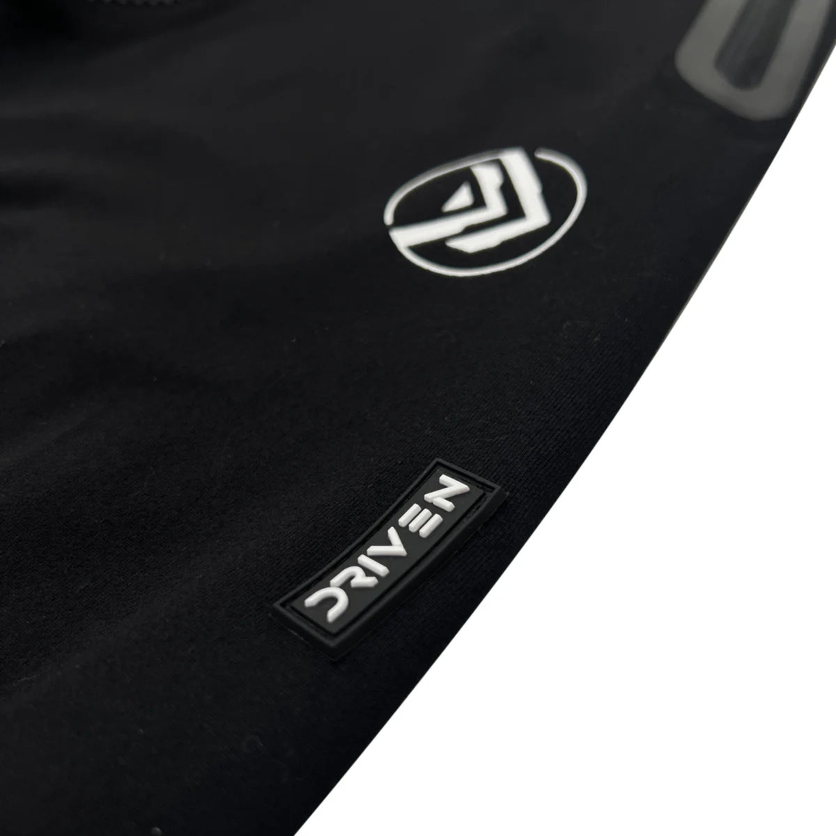 Black car mat with a logo and brand name on a white background