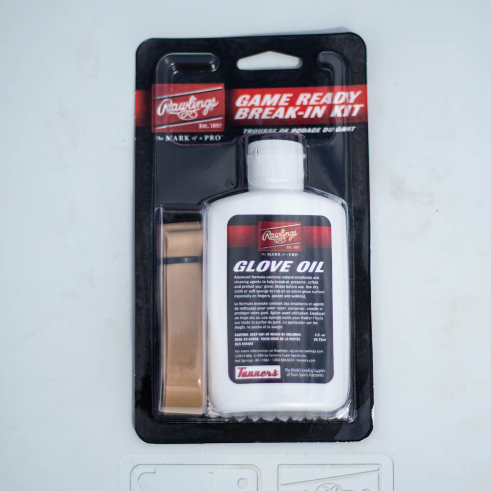 Rawlings Game Ready Break-In Kit in retail packaging, including glove oil and an applicator cloth designed to help soften leather and speed up the break-in process for baseball and softball gloves. ⚾