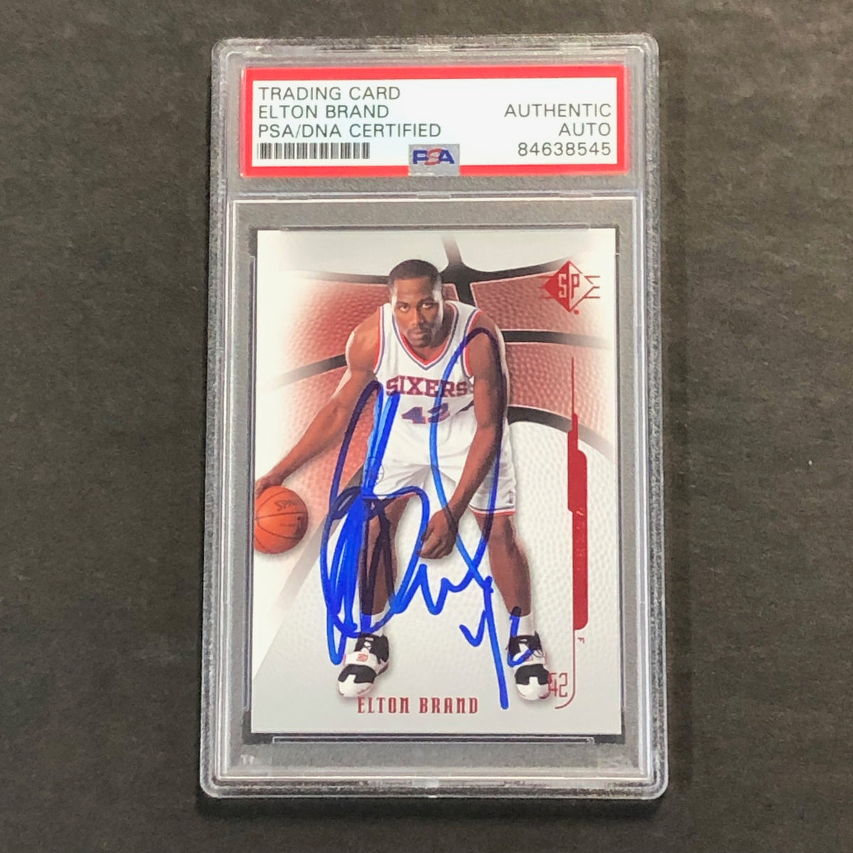 Front of Elton Brand Upper Deck SP #63 signed card in PSA/DNA holder