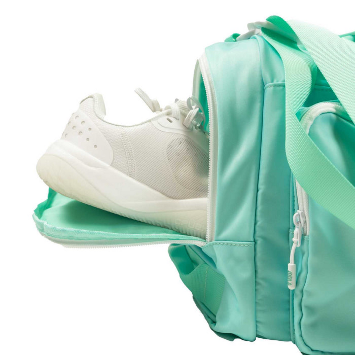 Light blue backpack with a white sneaker inside on a white background