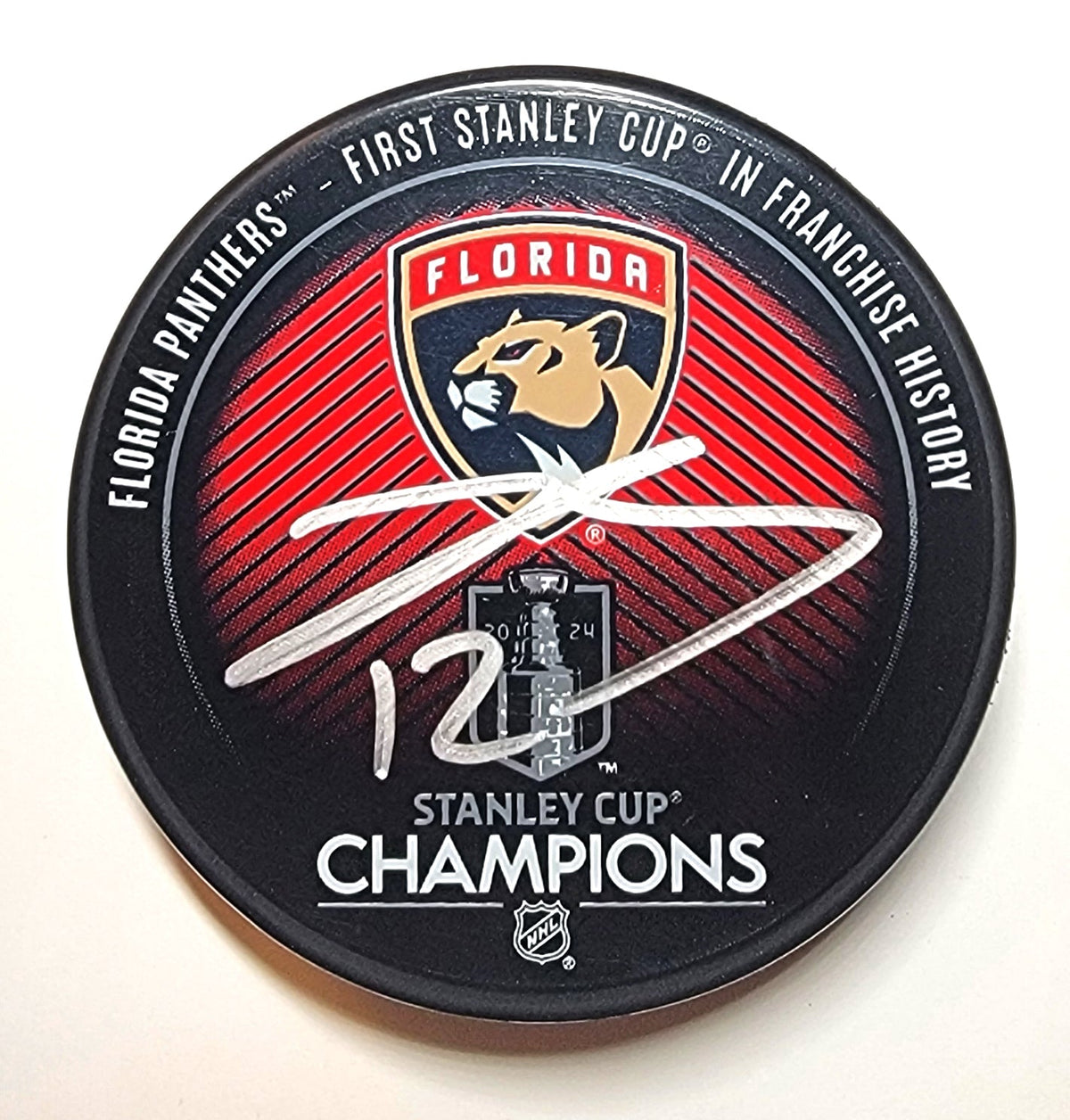 Jonah Gadjovich Autographed Florida Panthers 2024 Stanley Cup Champions Hockey Puck Beckett