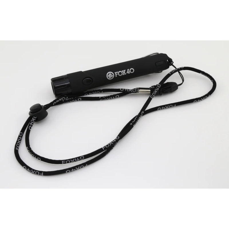 Compact electronic whistle device with push-button activation and attached lanyard for hands-free carrying and easy access.