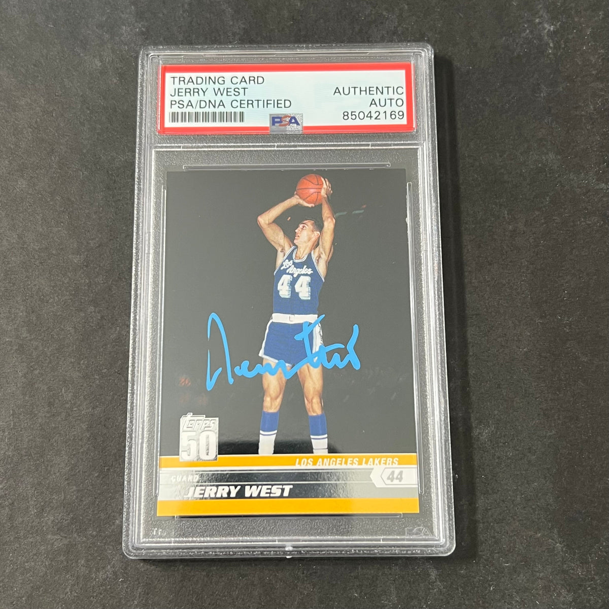 Front of Jerry West Topps #48 signed card in PSA/DNA holder