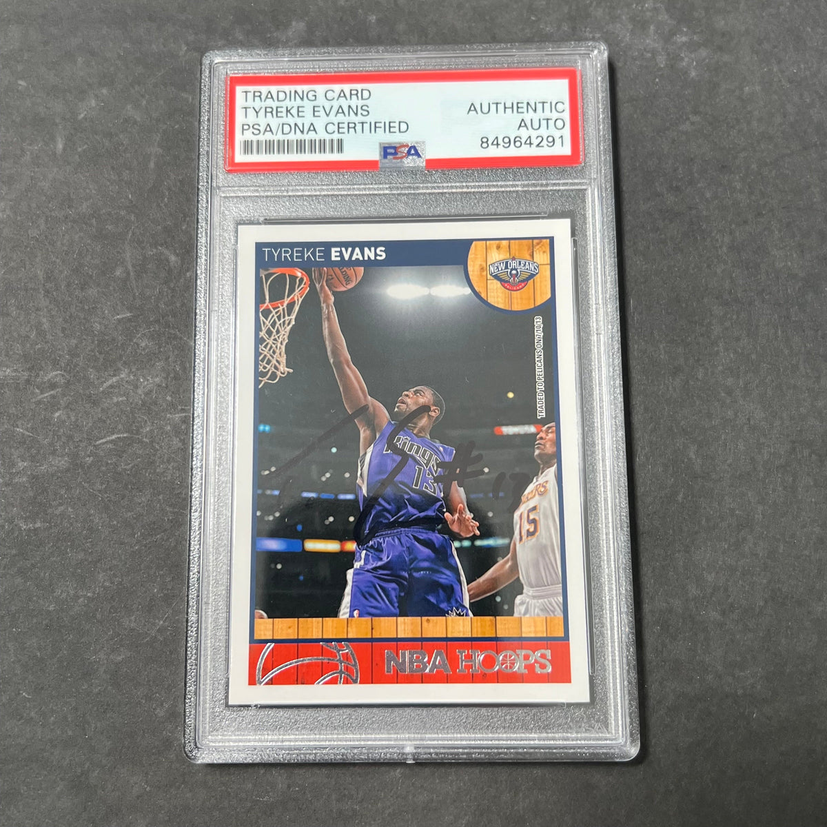 Front of Tyreke Evans 2013-14 Hoops #181 signed card in PSA/DNA holder