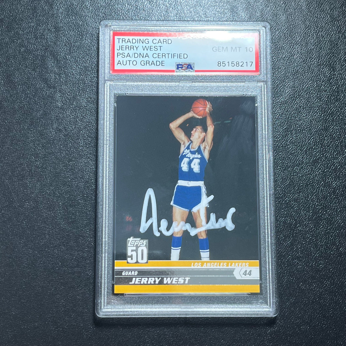 Front of Jerry West Topps #48 signed card in PSA/DNA holder