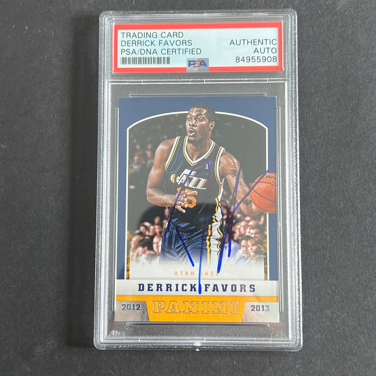 Front of Derrick Favors 2012-13 Panini #48 signed card in PSA/DNA holder