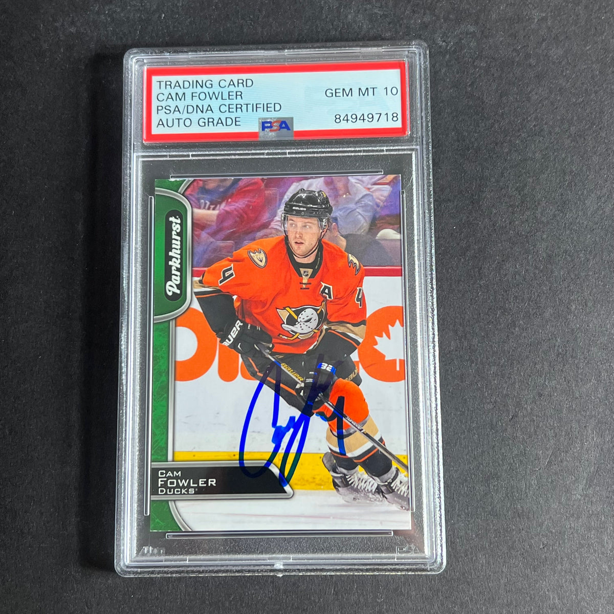 Front of Cam Fowler 2016-17 Parkhurst #6 signed card in PSA/DNA holder
