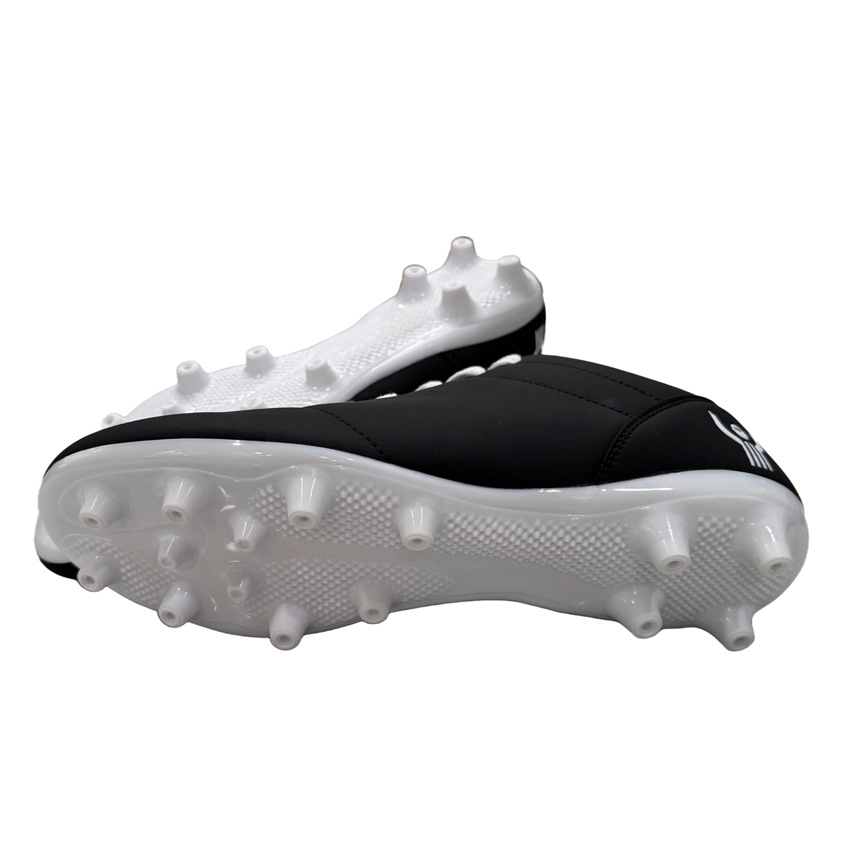 Great Call Athletics Courage Soccer Shoe in Black - stacked side view with cleats