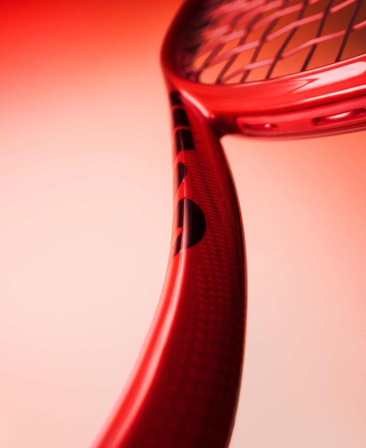 Wilson Defyer 100L V1 Tennis Racket Unstrung, 10.1 oz in Red - feature detail